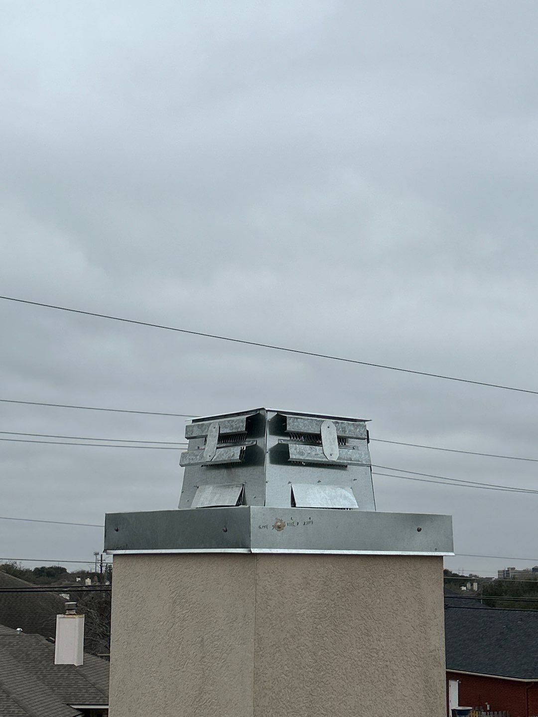 Residential Roofing Repair using Galvanized Chimney Cap & Chase by Lighthouse Roofing