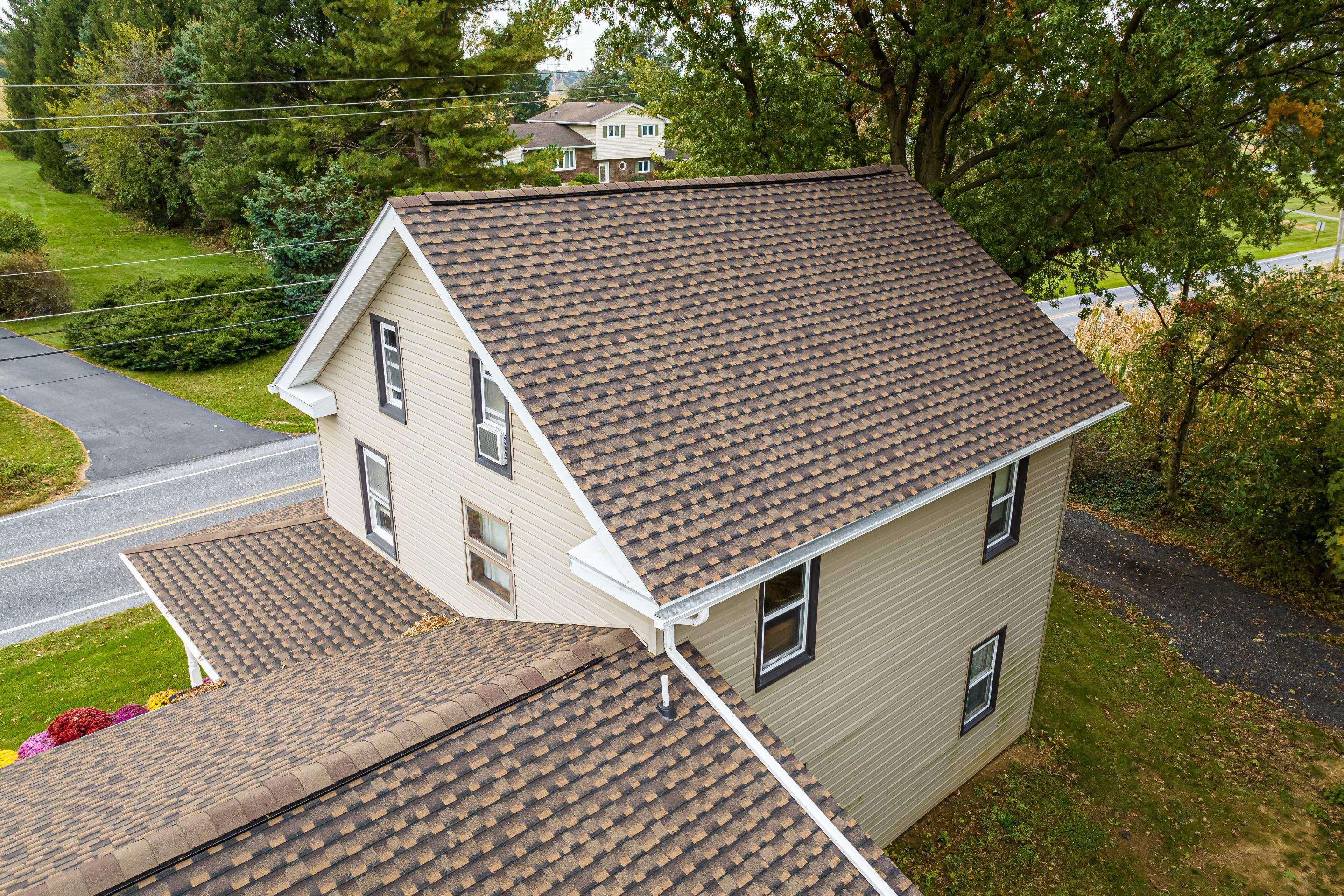 Reshingle-barkwood UHDZ- and new windows by Esh Builders