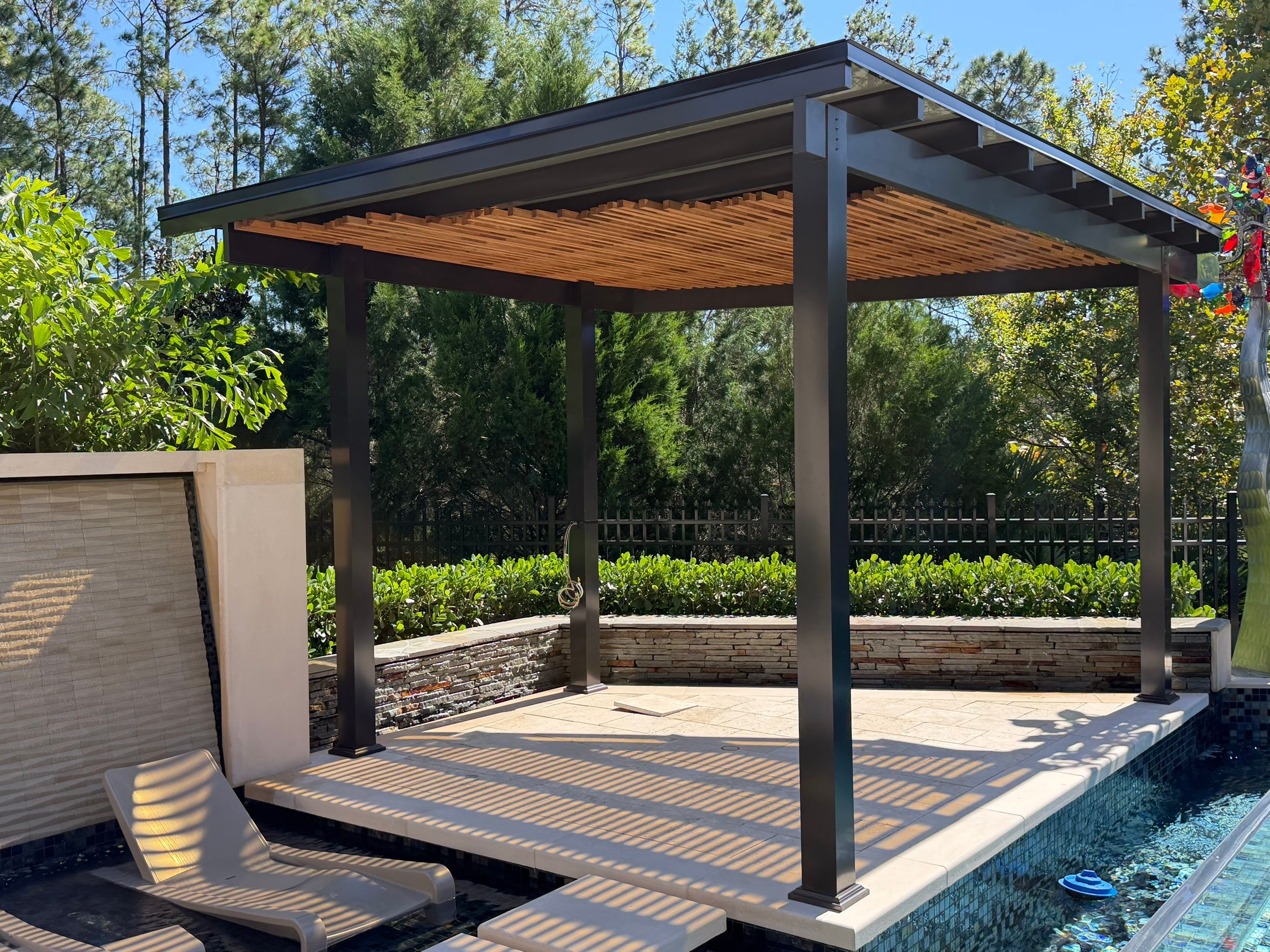 Sculpting with Light: Translucent Roof System with Garapa Accents by Orlando pergolas