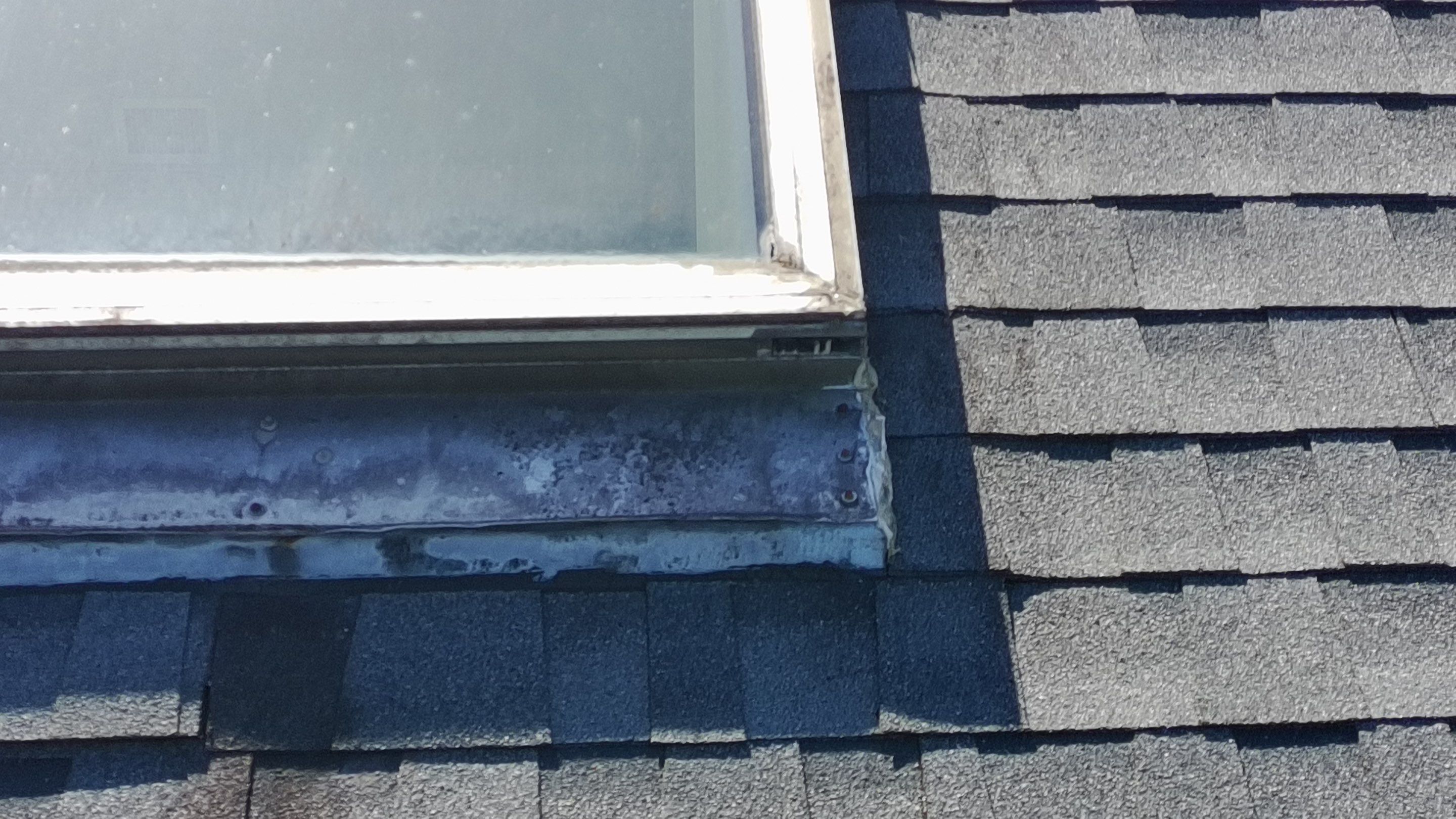 Ridge Skylight Repair and Shingle Roof Maintenance in Winter Park by Fortified Roofing Solutions Corp.