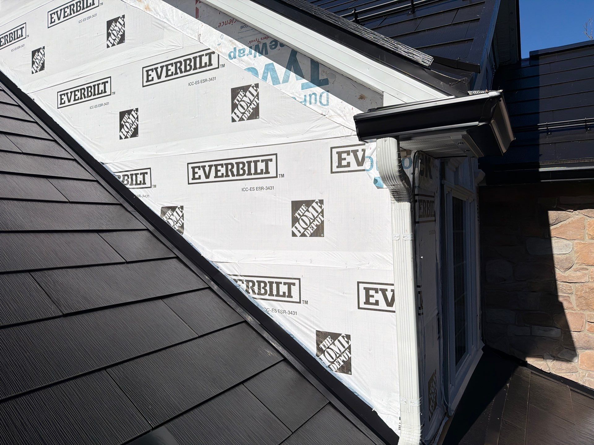 Beautiful James Hardie Siding & Tesla Solar Roof by American Home Contractors