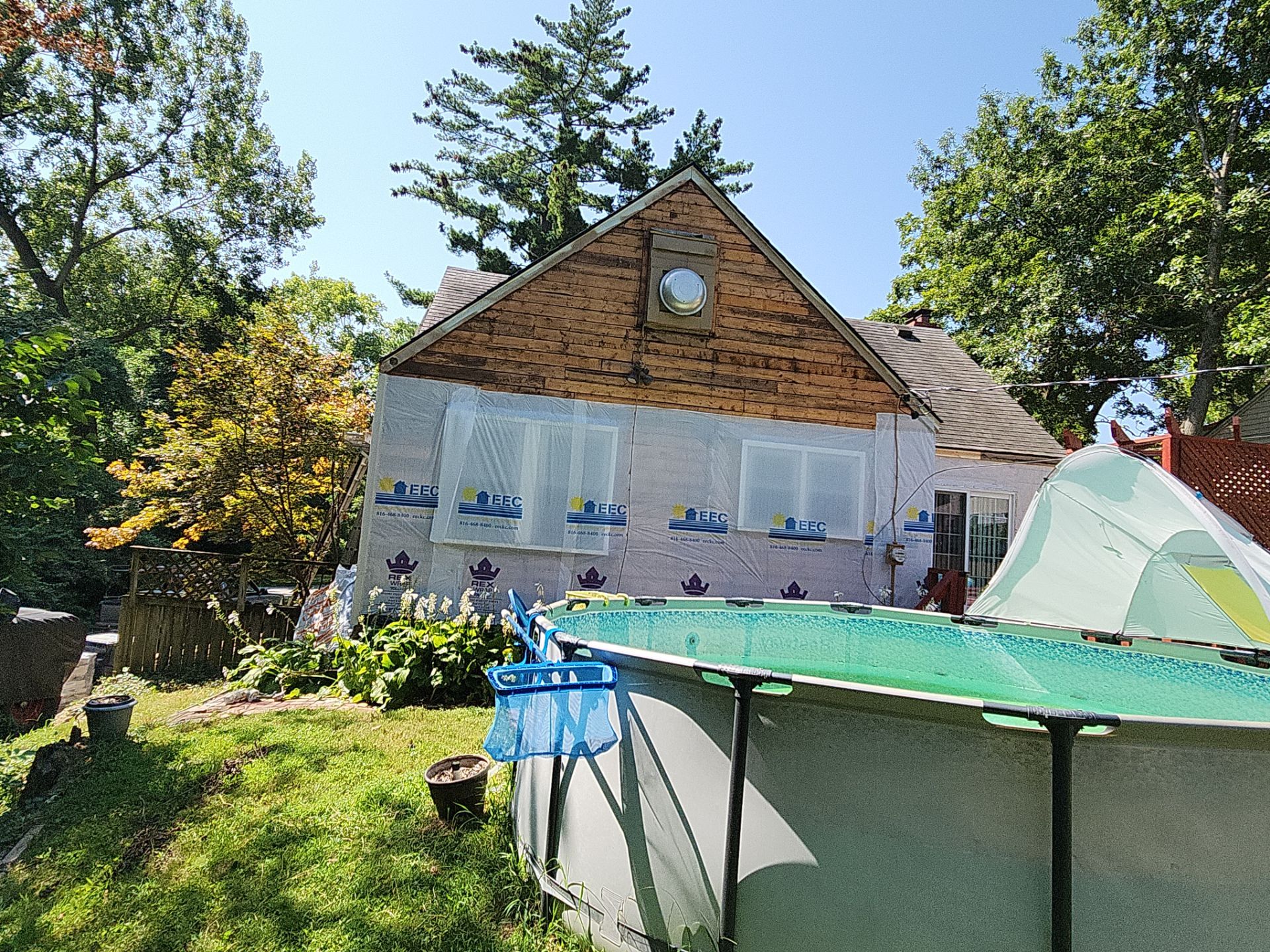 Kansas City Indigo Insulated Craneboard Siding and Window Replacement Project in Kansas City by EEC Windows, Siding & Roofing