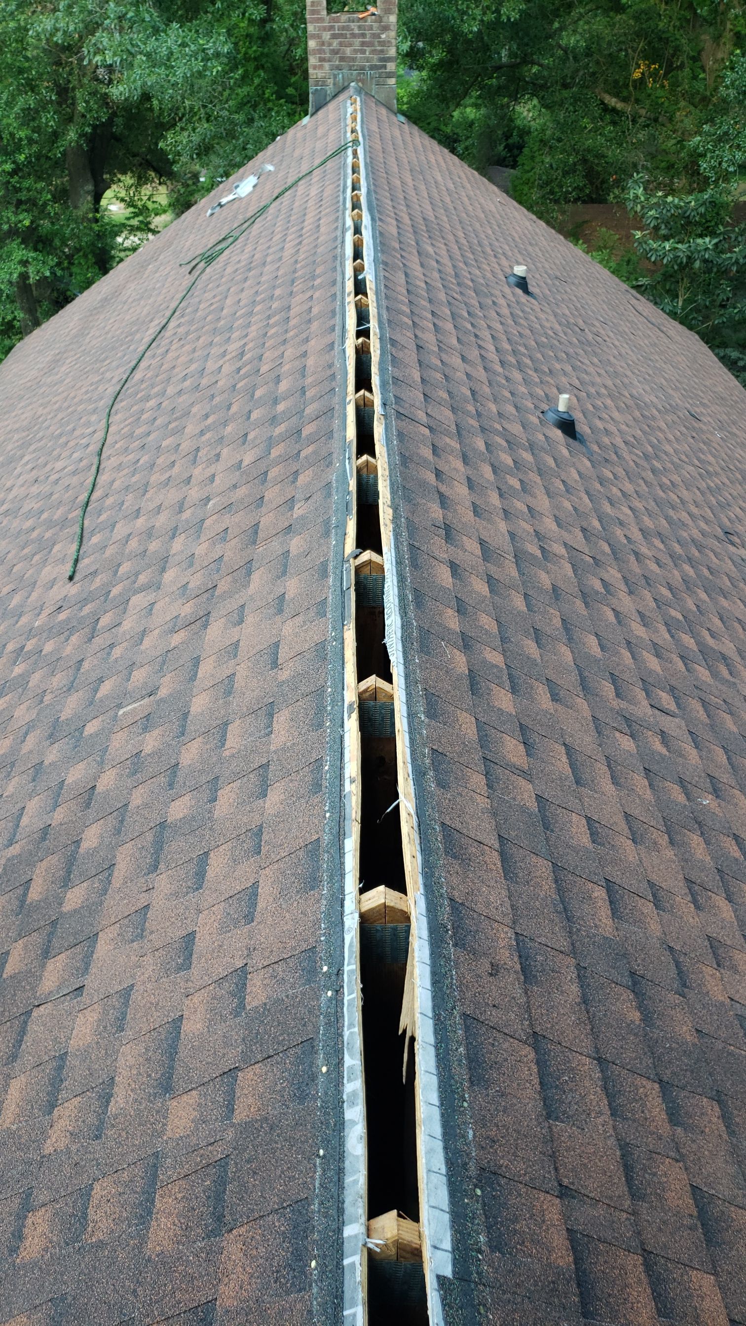 Residential Roofing Installation using Roof Replacement by American Roofing & Construction LLC