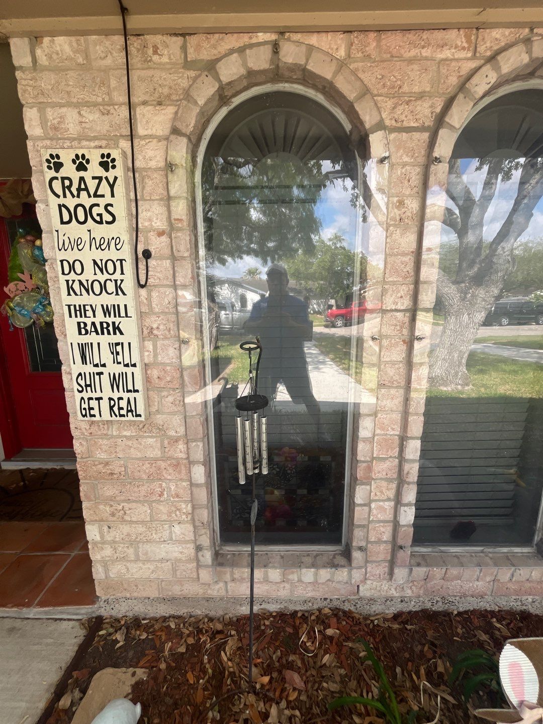 Colored Vinyl Windows to blend into brick by Bayfront Roofing and Construction