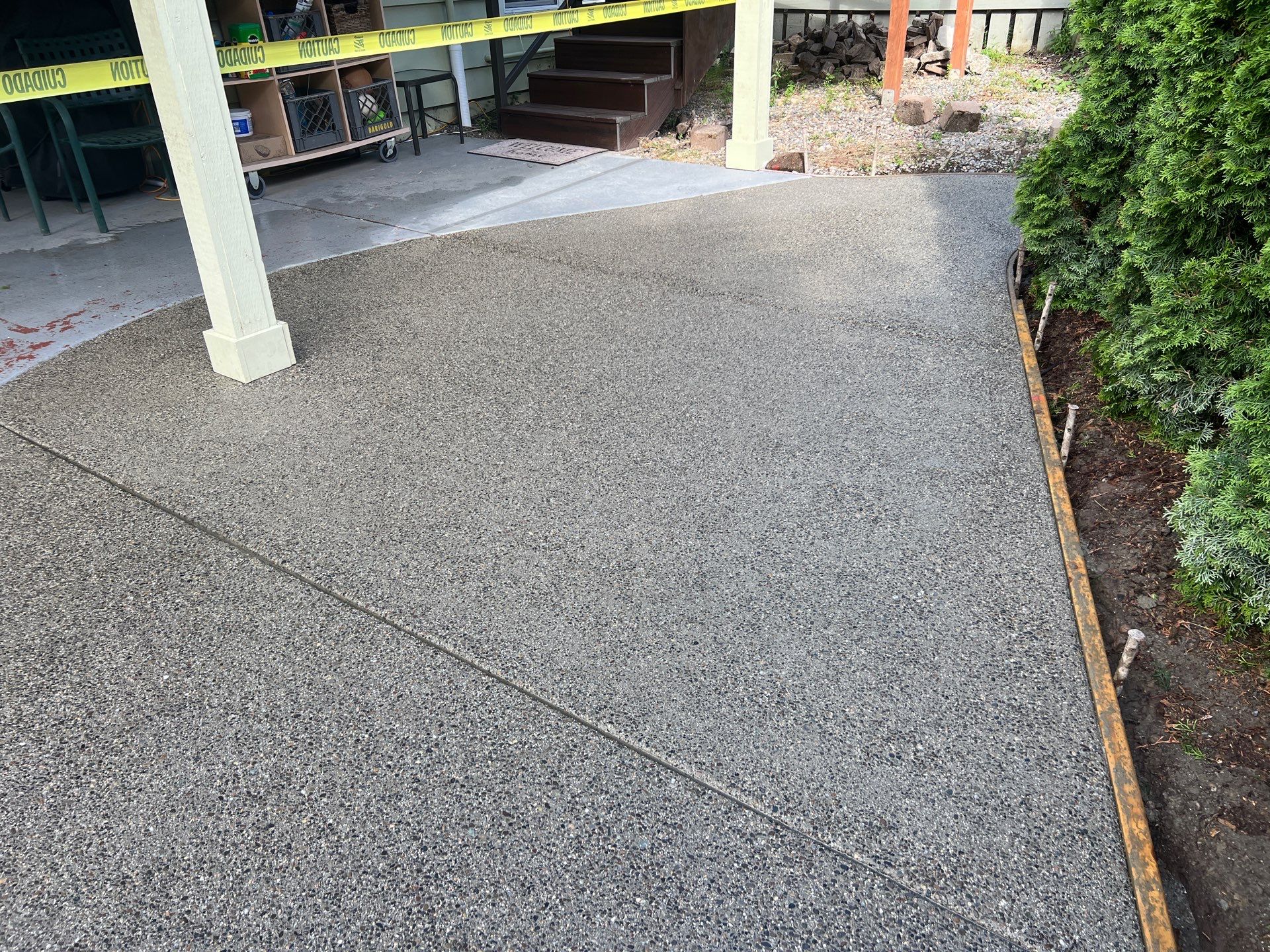 Ashley | Concrete Back Patio by Jireh Asphalt & Concrete Inc 