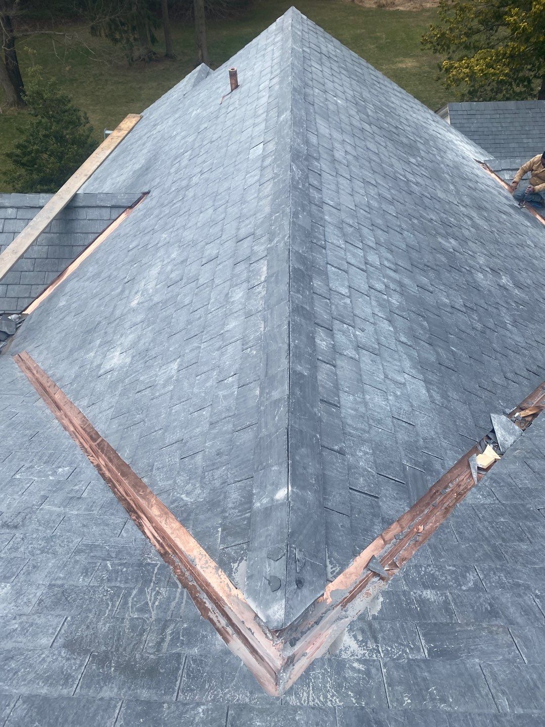 Residential Roofing Installation using Vermont Slate by A Plus Exterior