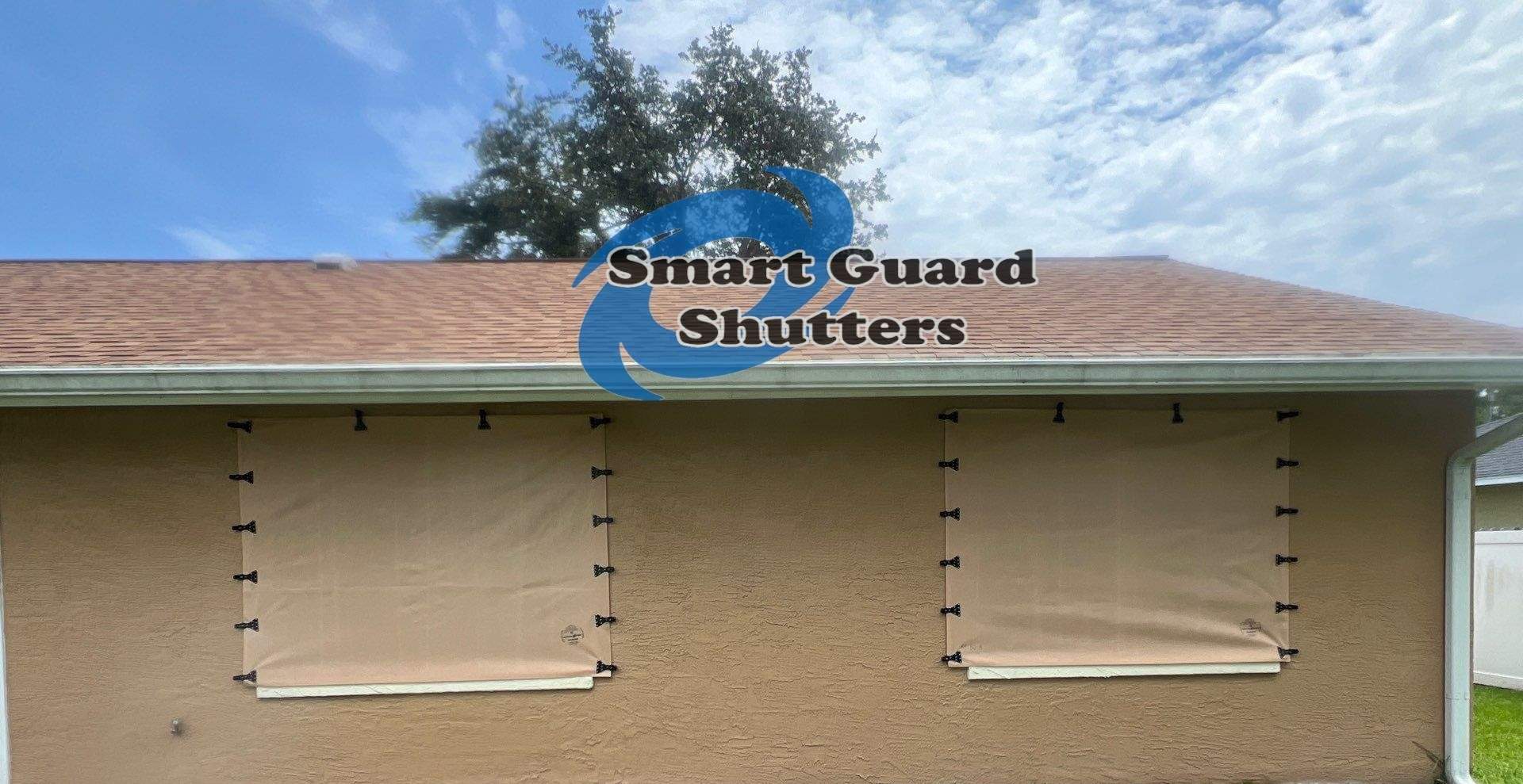AstroGuard Hurricane Fabric in Tan by Smart Guard Shutters