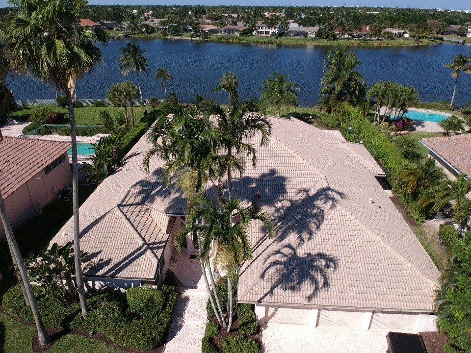 Residential Roofing Installation using 1" Nail strip metal roof by BLUES BROTHERS CONSTRUCTION CORP