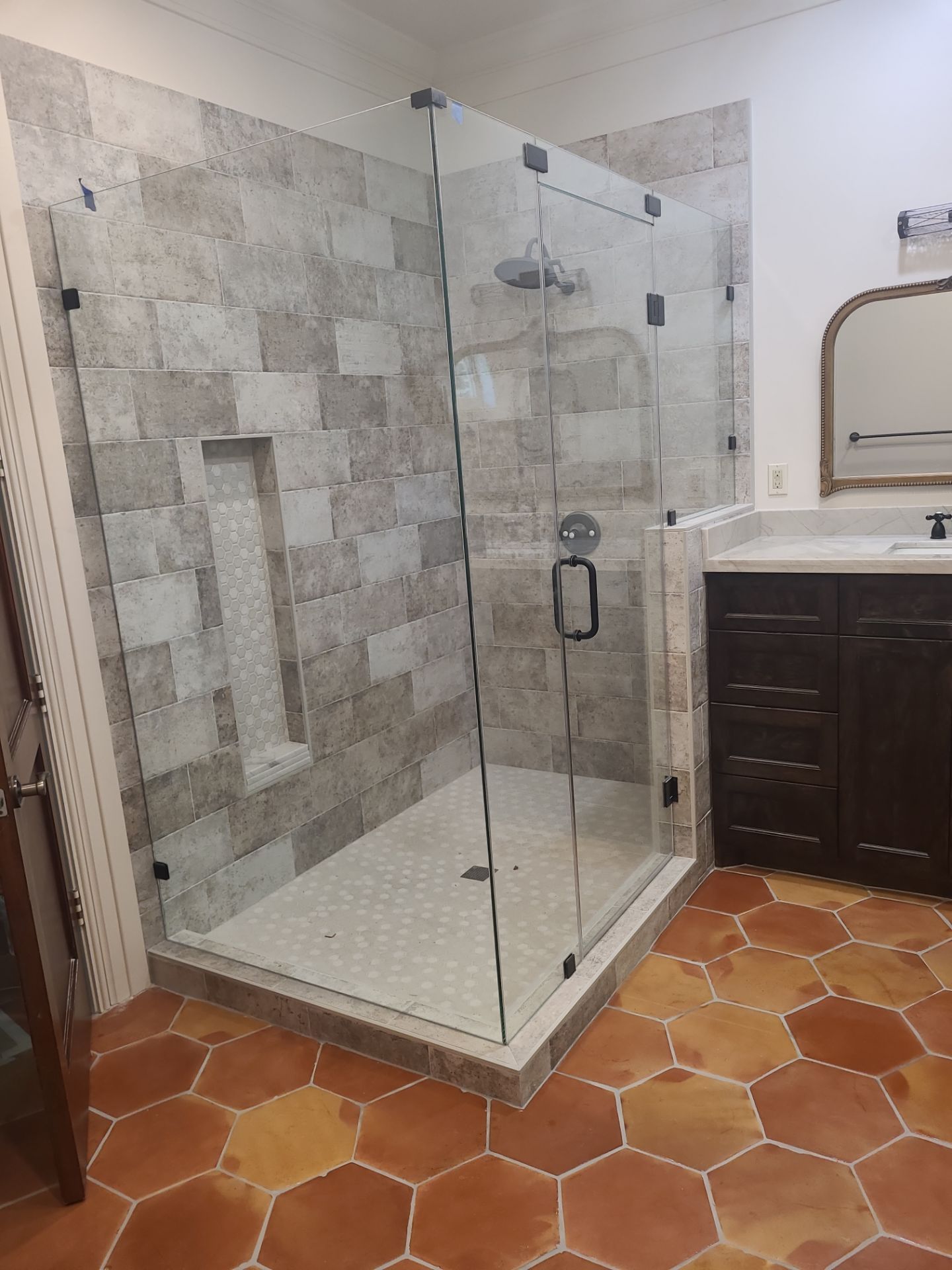 Bathroom Remodel and Flooring in Tomball, TX by SophAlx LLC
