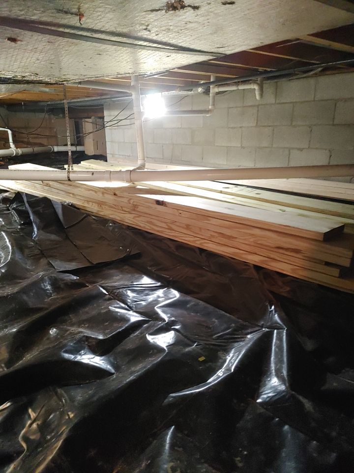 Crawl space encapsulation and Waterproofing using Structural Wood and Steel Reinforcements by Toledo Basement Repair 