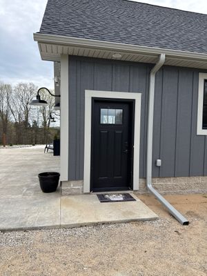 White Gutter and Downspout Installation on Modern Kingsley Residence