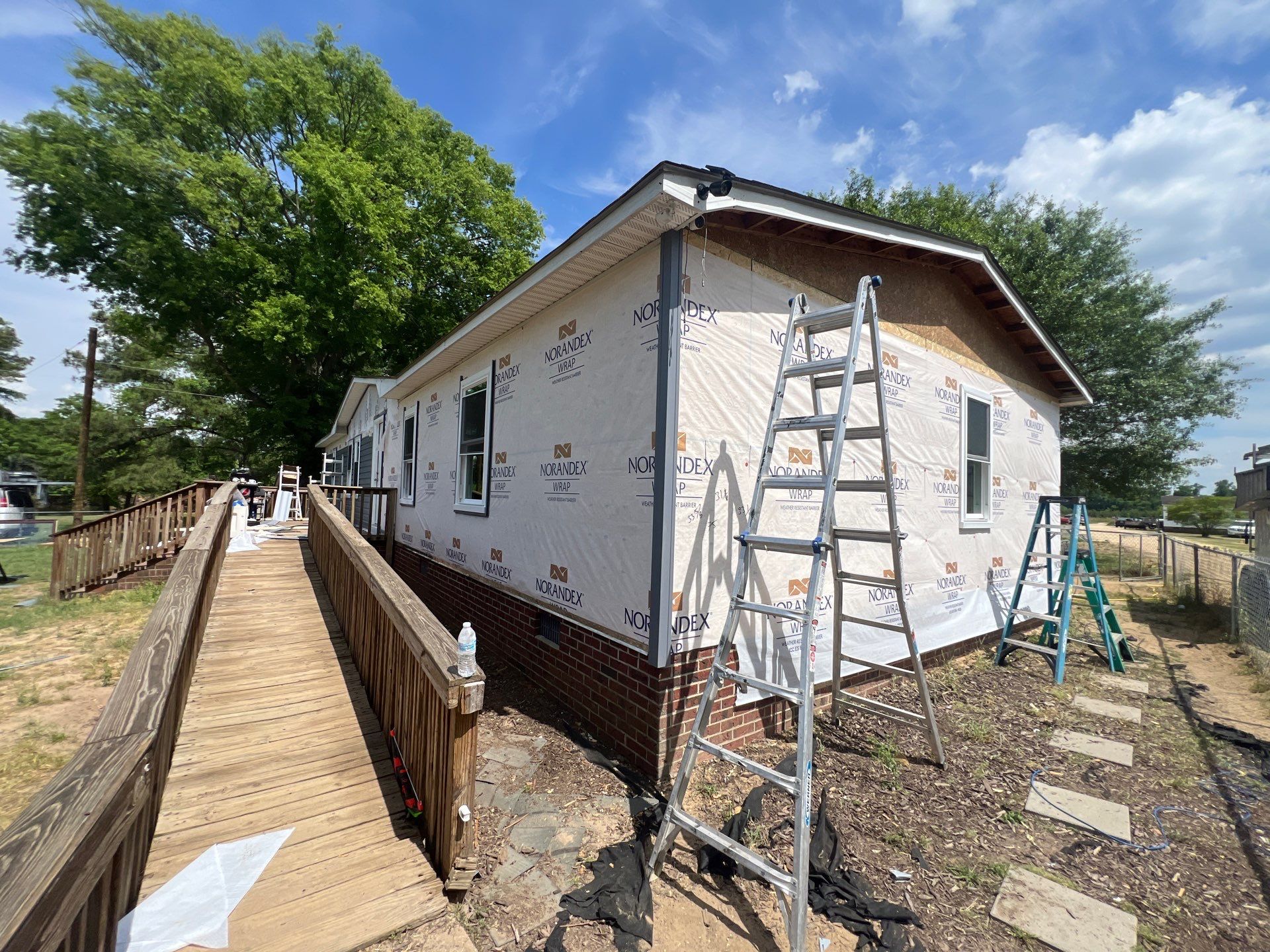 Vinyl Siding and Window Replacement for Goldsboro Modular Home by The Remodeling Company