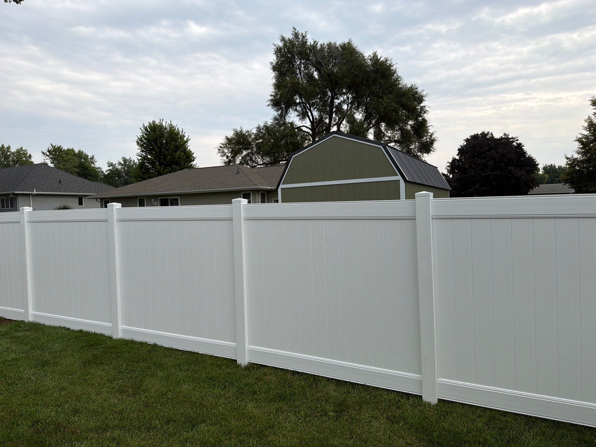 White Vinyl Privacy Fence and Double Gate Installation in Jesup by Perfect Picket Fence and Stain