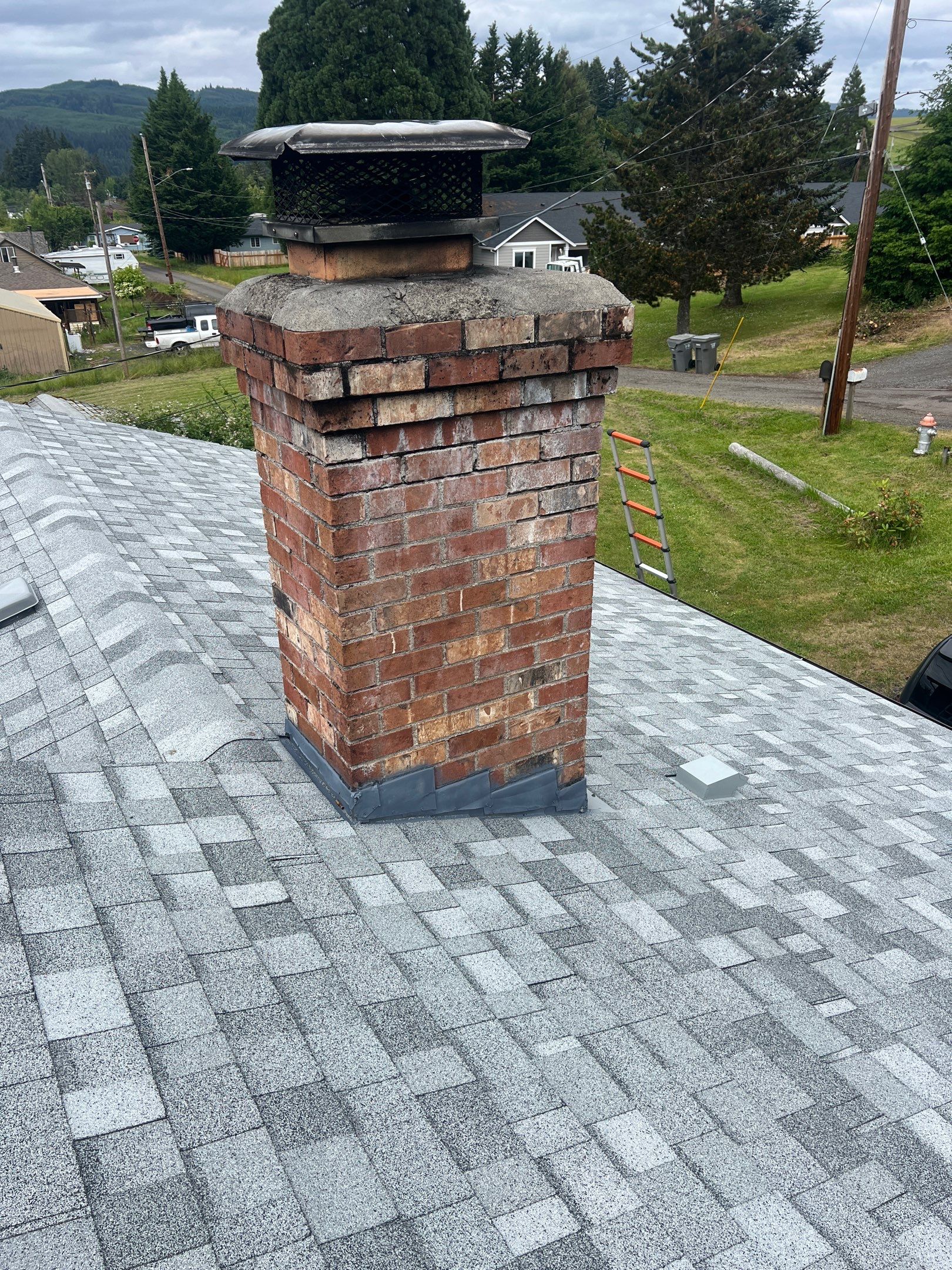 Residential Roofing Installation using IKO Dynasty (Color: Frostone Grey) by Orezona Building & Roofing Company, Inc.