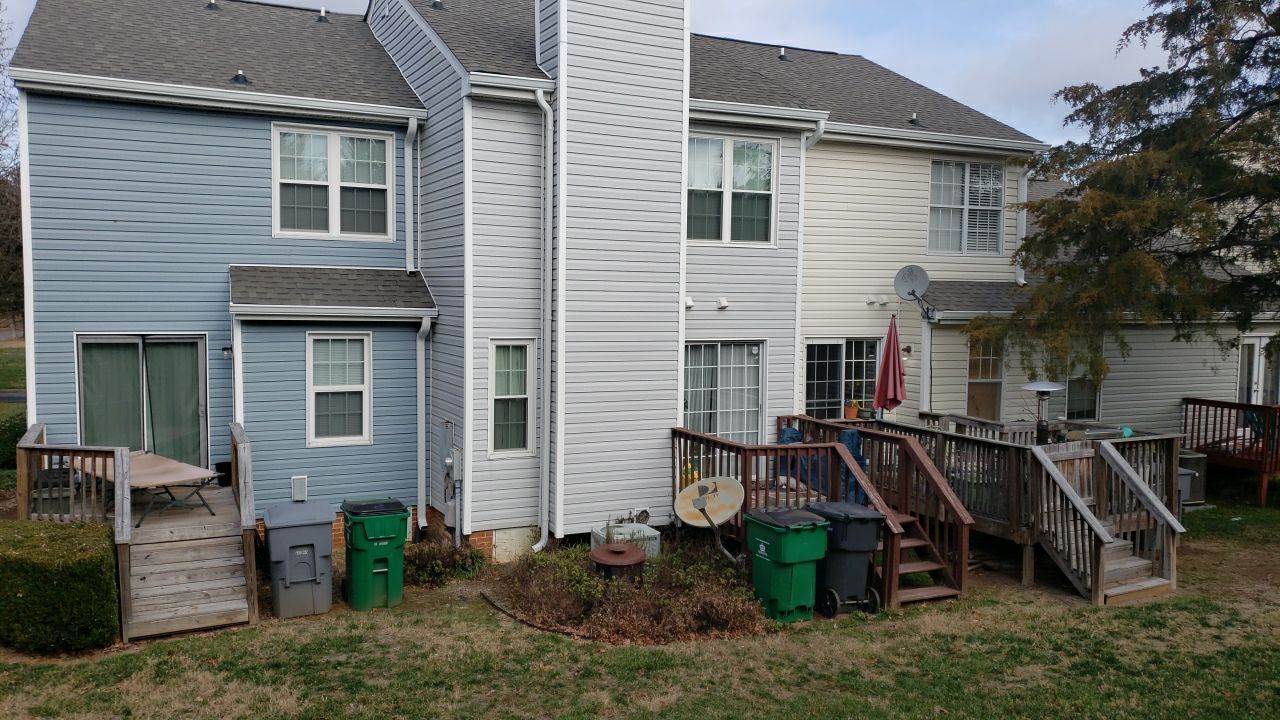 Gutter Cleaning using water by Power Wash Masters LLC