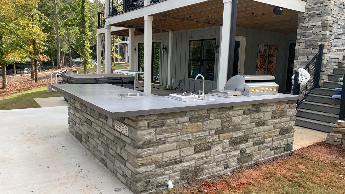 Outdoor Kitchen on Lake Keowee by Xtreme Concrete Services