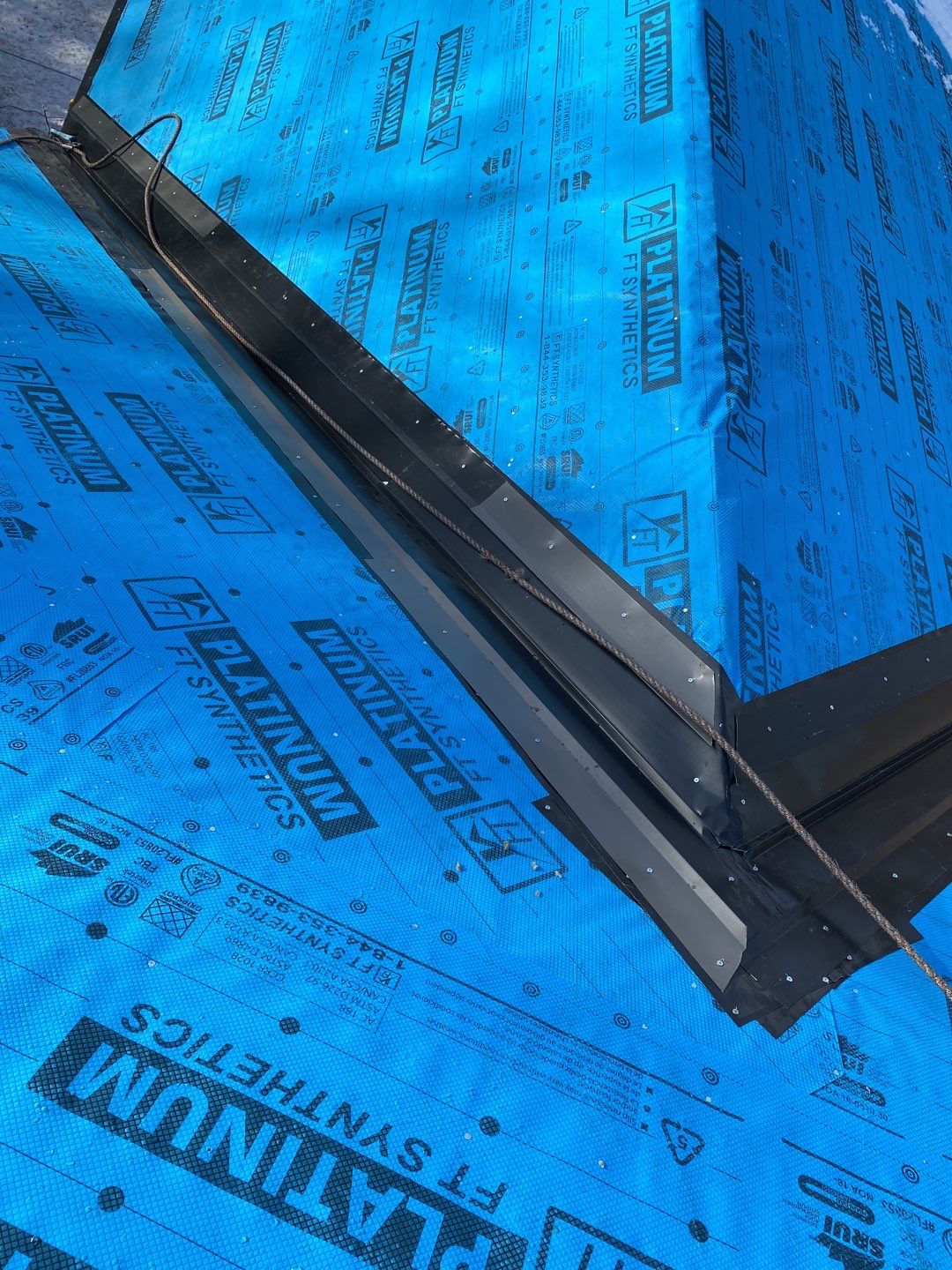 New Home Construction using 16" Standing Seam Panels by Jay Carter Roofing & Sheet Metal