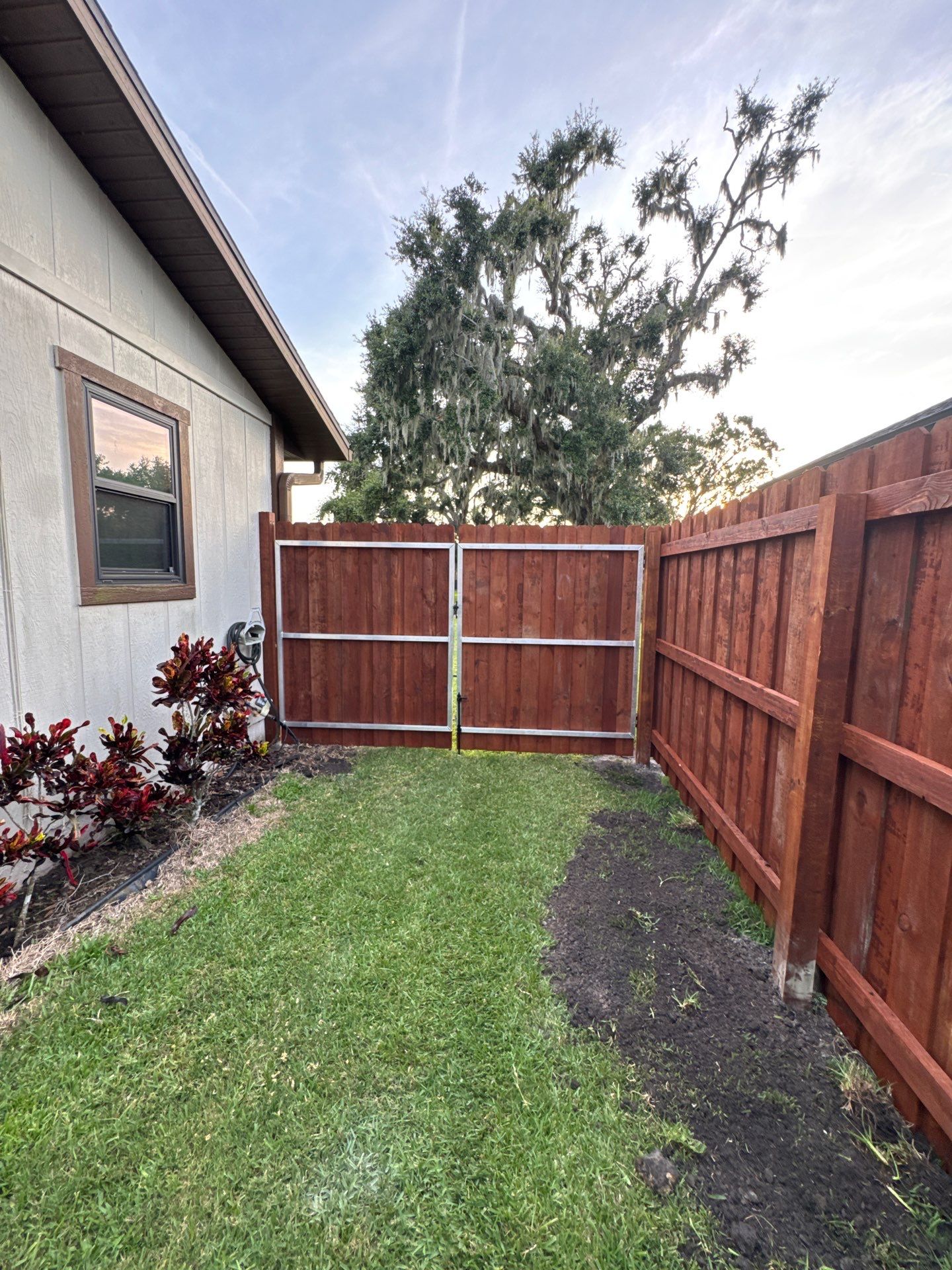 Wood Fence Installation using Pre-stained Pine Board On Board by Asap fence and gates, LLC