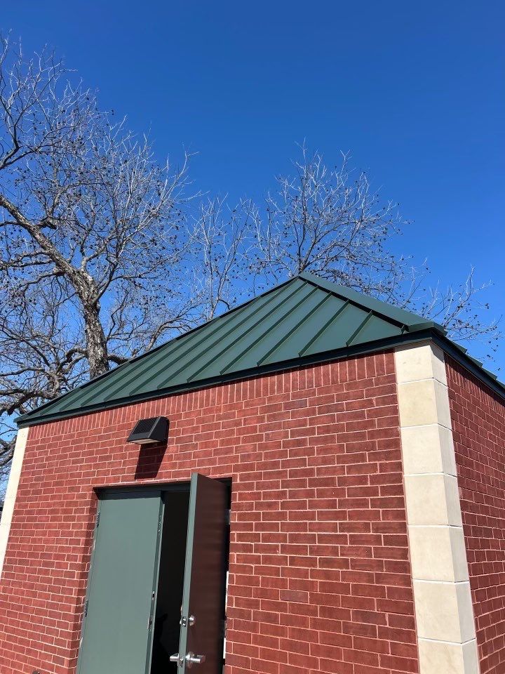 Commercial Roofing Installation using Standing Seam Metal Roofing by Harvey Roofing & Construction