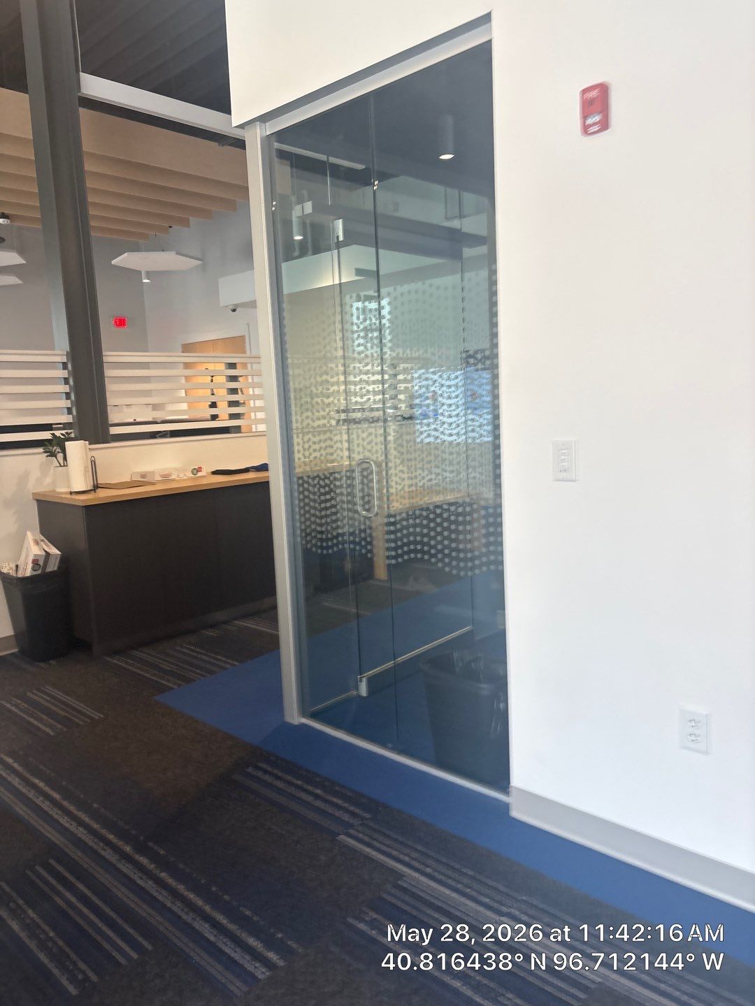 Modern Office Remodel with Acoustic Baffles and Glass Partitions by CompanyCam Sales Demo
