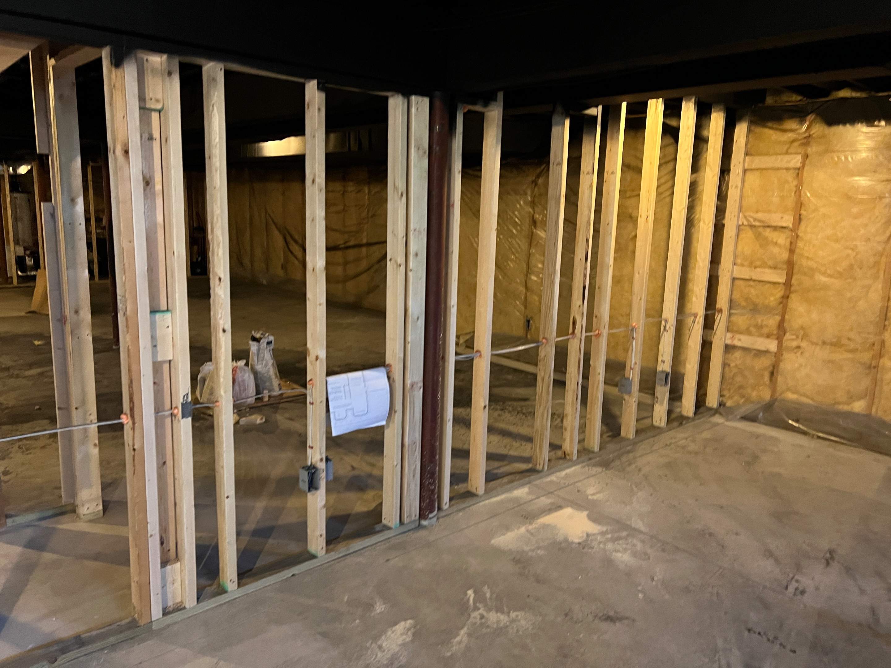 Basement Remodel w/ LVP Flooring & Exposed Ceiling by Chagnon Building & Remodeling LLC