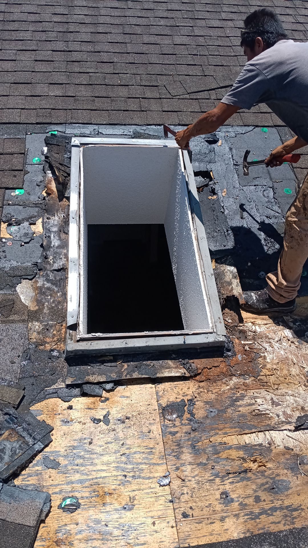 REPLACE NON APPROVED SKYLIGHT ALONG WITH CLOGED GUTTER by Morton Roofing, Inc.