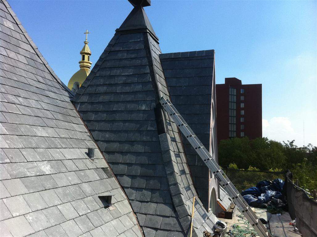 Historic Building ROOF REPLACEMNT with GAF TruSlate  on steep slop and Versico 60mil TPO on flat roof by Gorilla Exteriors Contracting, LLC