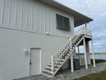 Bahama Shutters in Traffic Gray A by Smart Guard Shutters