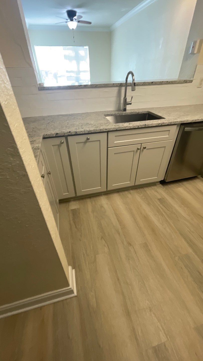 Home Remodel using LVP Flooring and Cabinets by HandyMangum