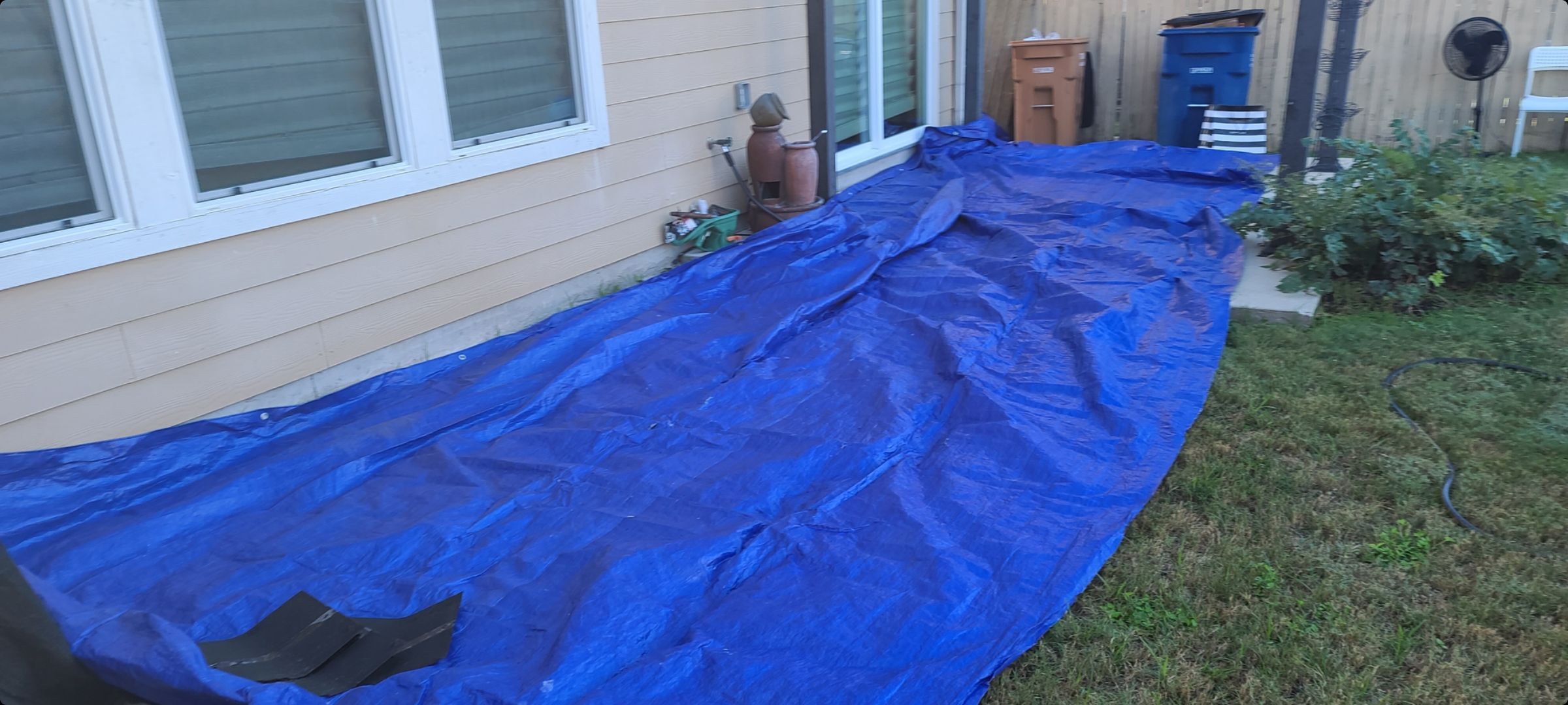 Hail Damage Restoration for Austin Two-Story Residential Home by Caliber Restoration LLC