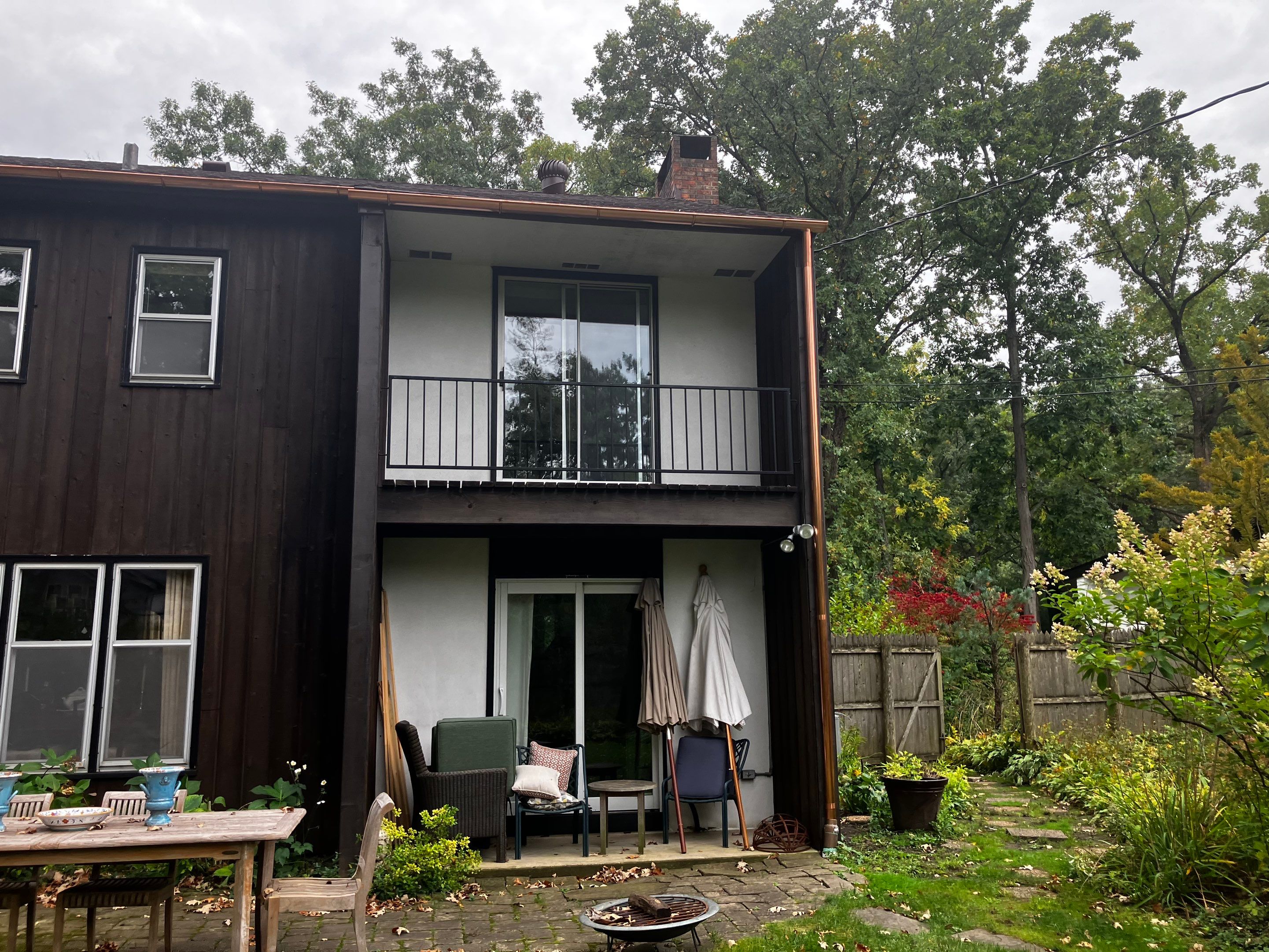 Asphalt Roof Replacement with Half Round Copper Gutter Installment  by Custom Installations, Inc.
