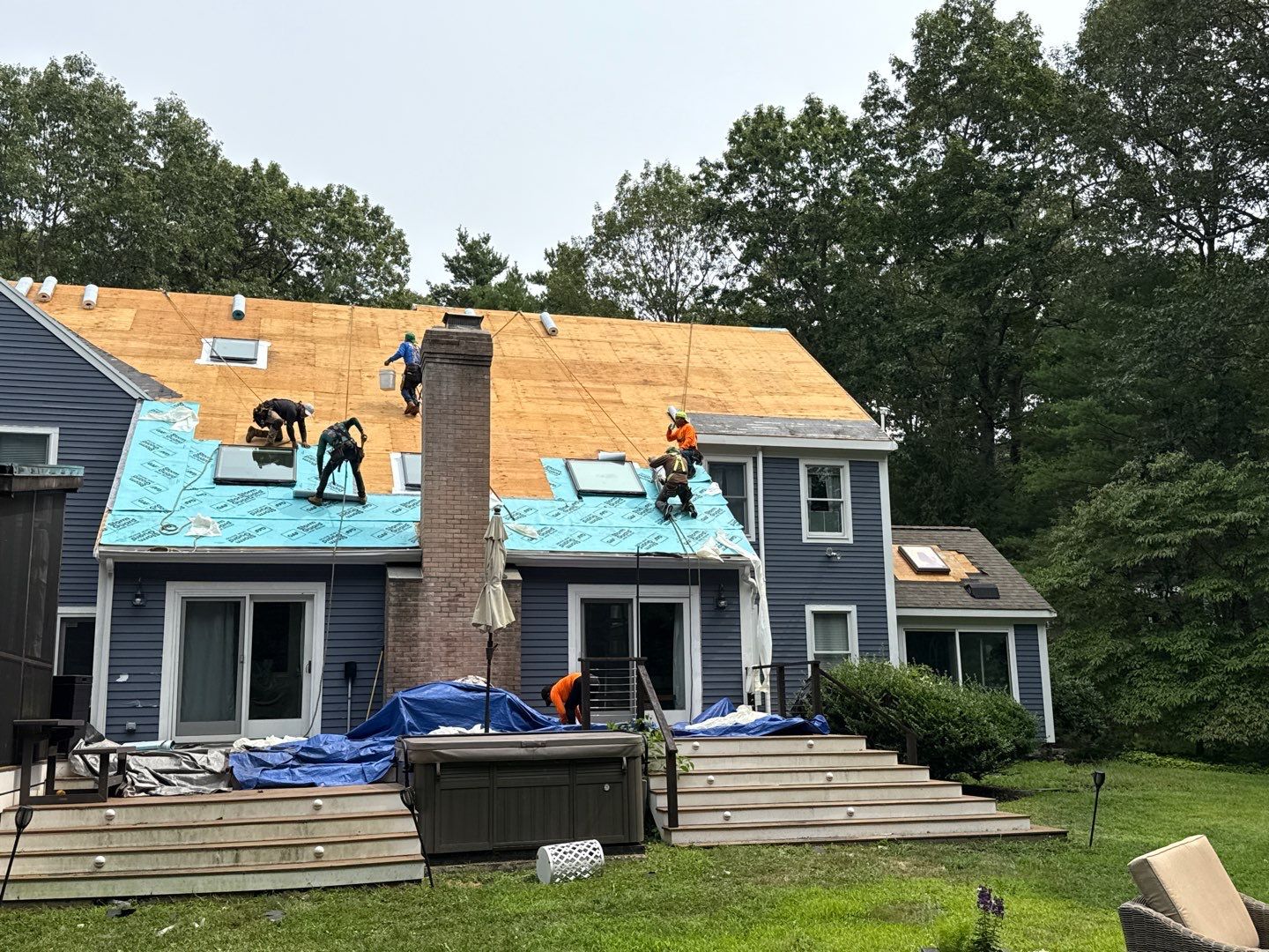 Solar-Ready Roof Replacement with GAF Pewter Gray Shingles & VELUX Skylights by Sensible Home Solutions