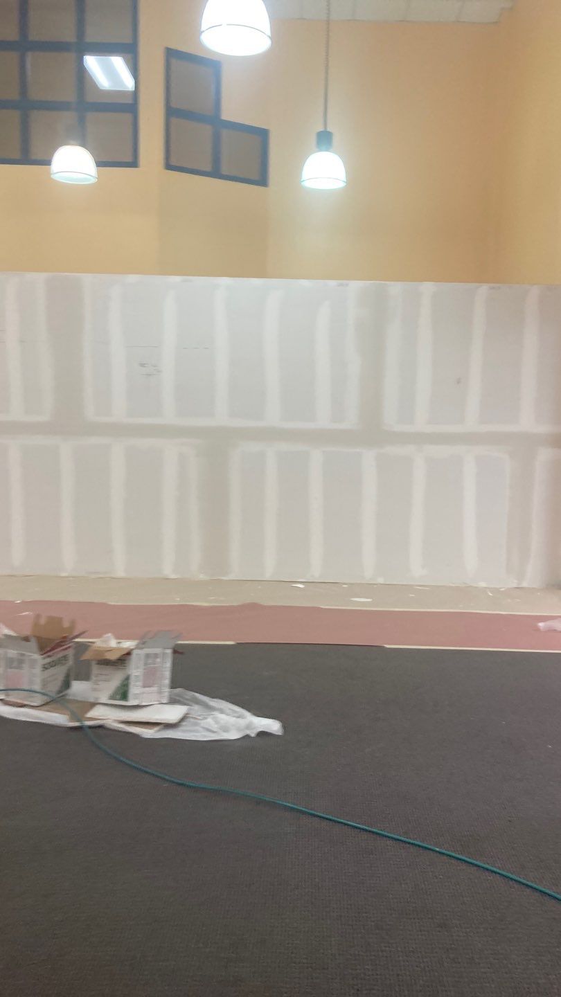 Wall Repair and Door Installation by Dodson House Moving