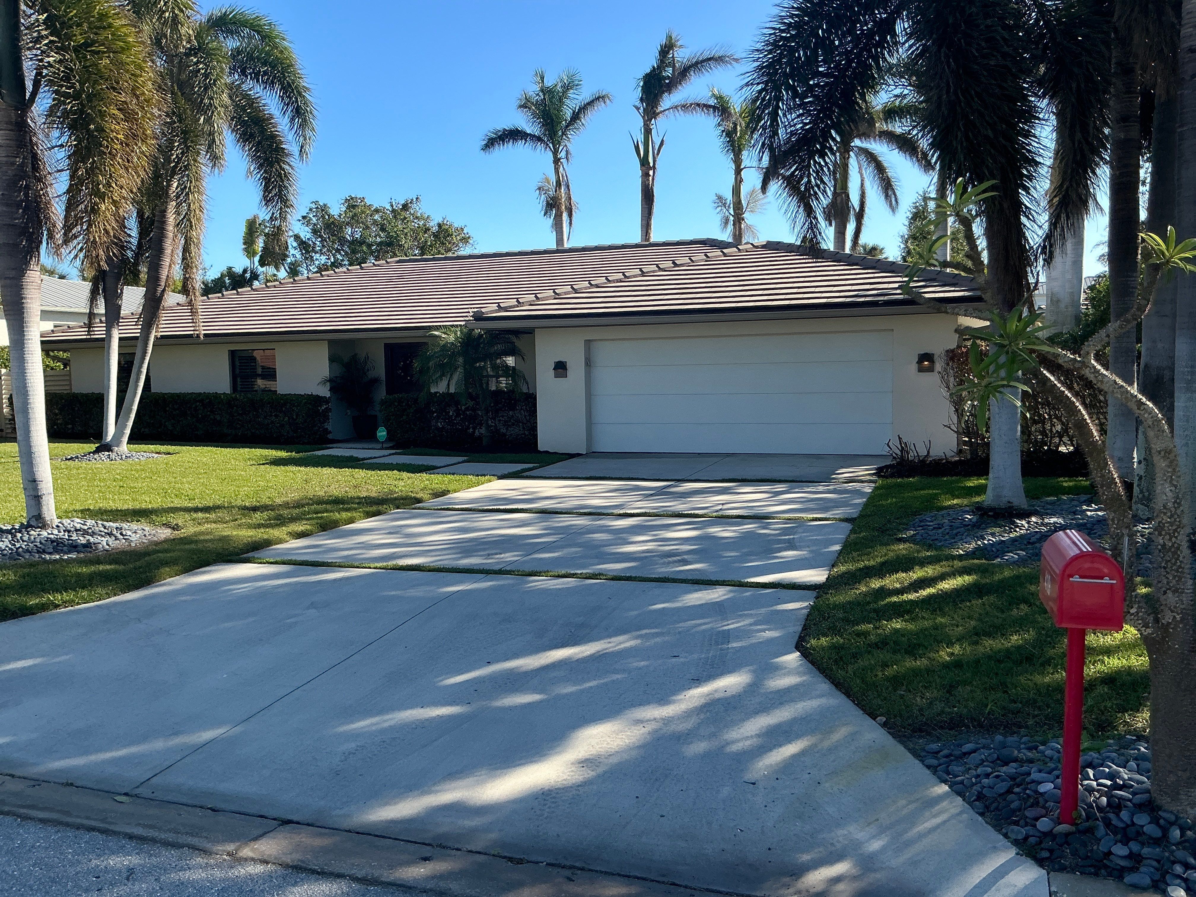 6-Inch White Seamless Gutters in Sarasota FL by Gutter Professors