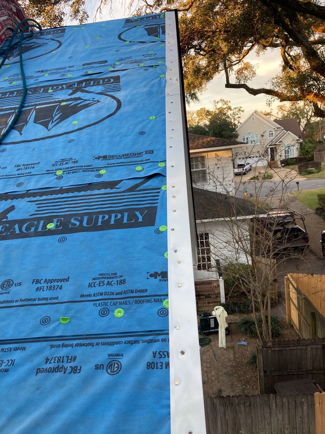 Residential Roofing Installation using Roof Replacement by American Roofing & Construction LLC
