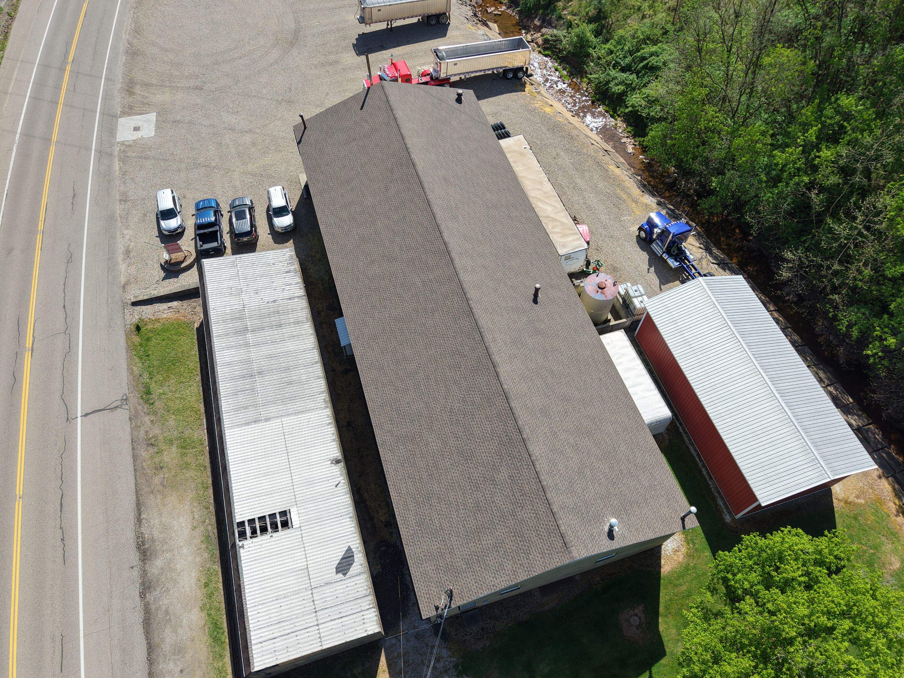 Commercial Roofing Installation using GAF Timberline HDZ Barkwood by Rainstoppers Roofing