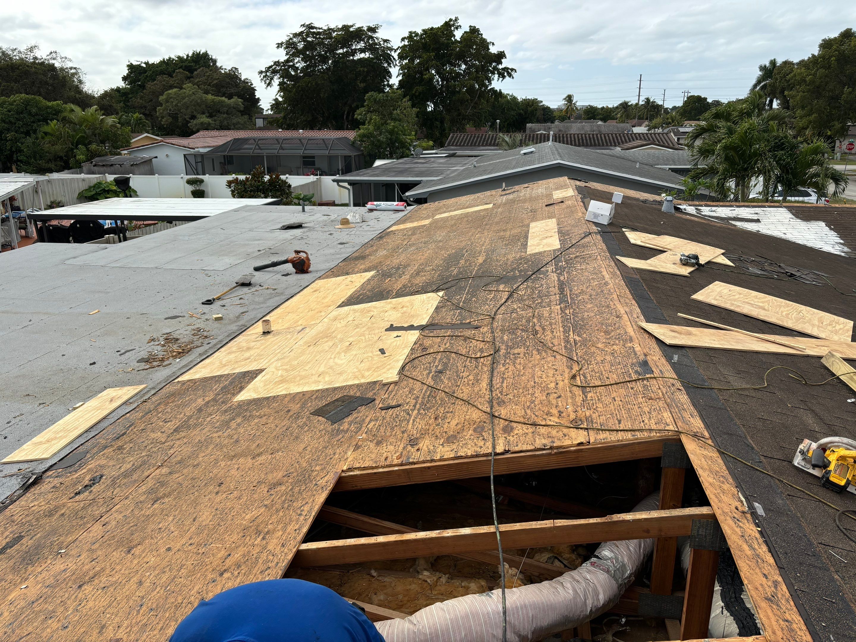 Residential Roofing Installation using Metal Roof  by City Roofing Inc