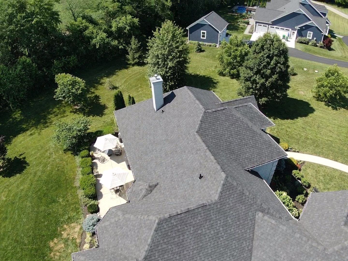 Residential Roofing Installation using Atlas Pinnacle Black Shingles by 614 Exteriors