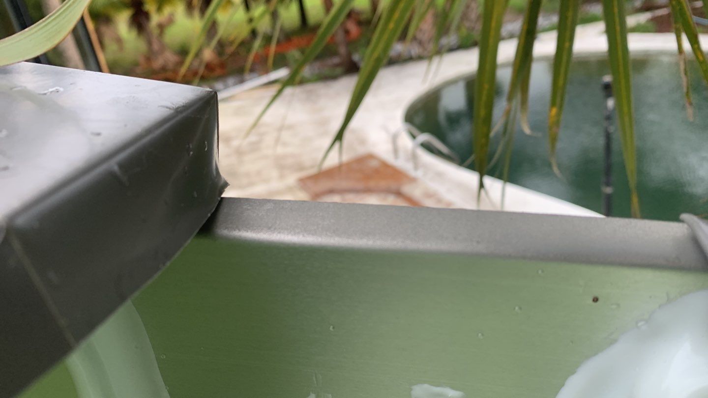 Seamless Gutter Installation using Charcoal Grey Gutters by Gutter Professors