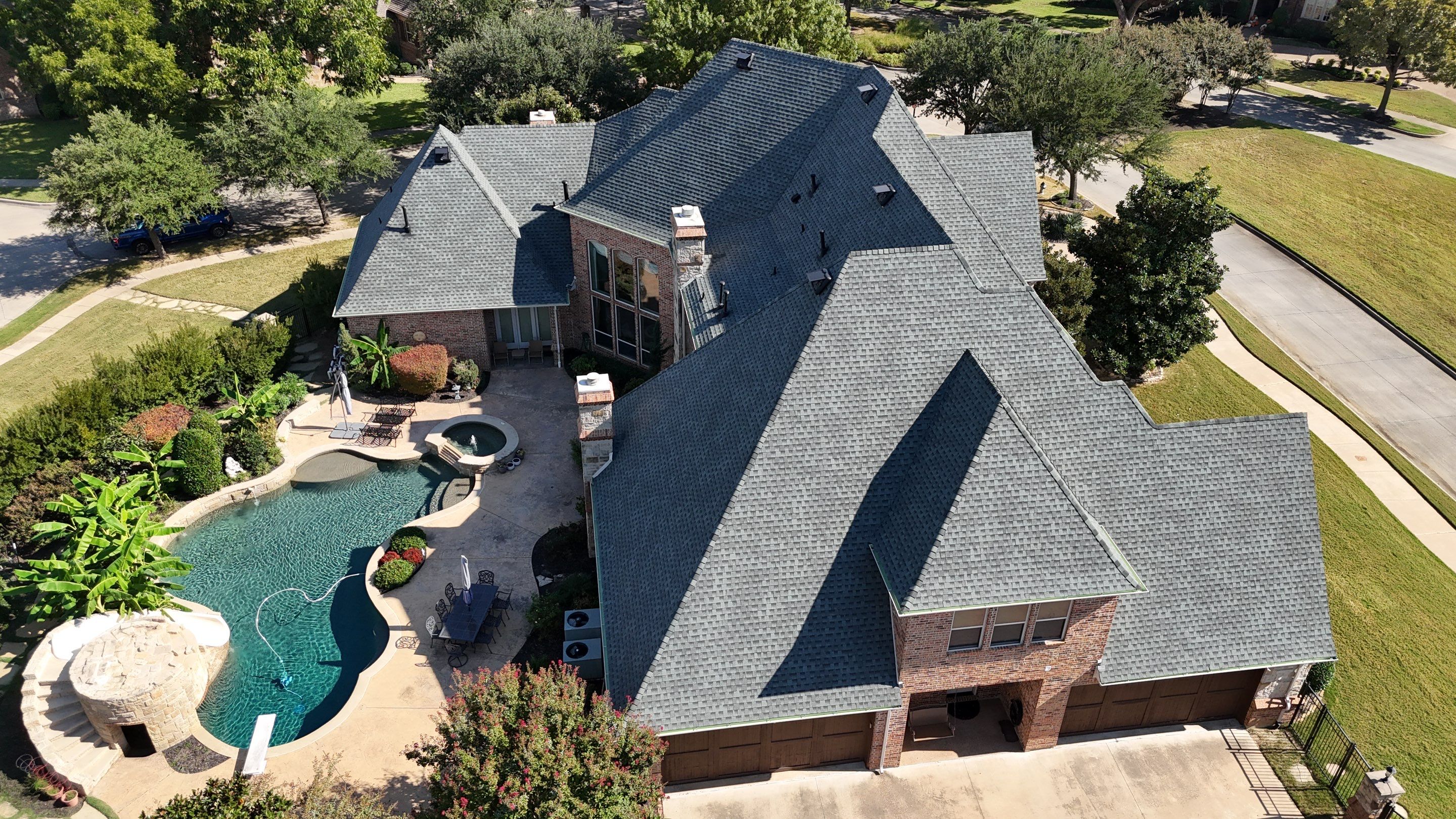 Southlake Texas Estate - Roof, Copper Awning and Gutter Project by First United Roofing & Construction