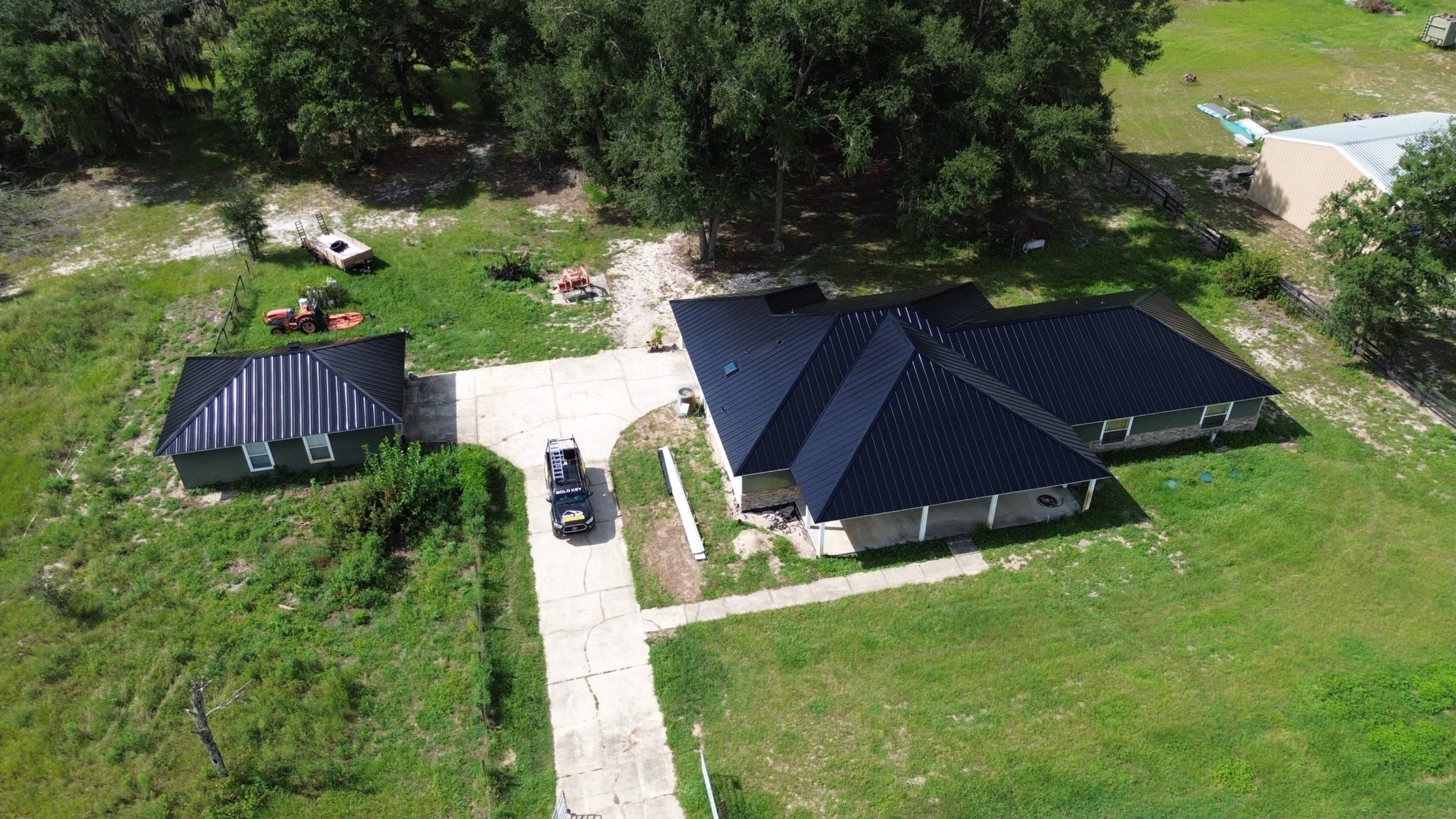Residential Reroof | Architectural Shingles to 26 Gauge Standing Seam Metal | Groveland Fl by Gold Key Roofing
