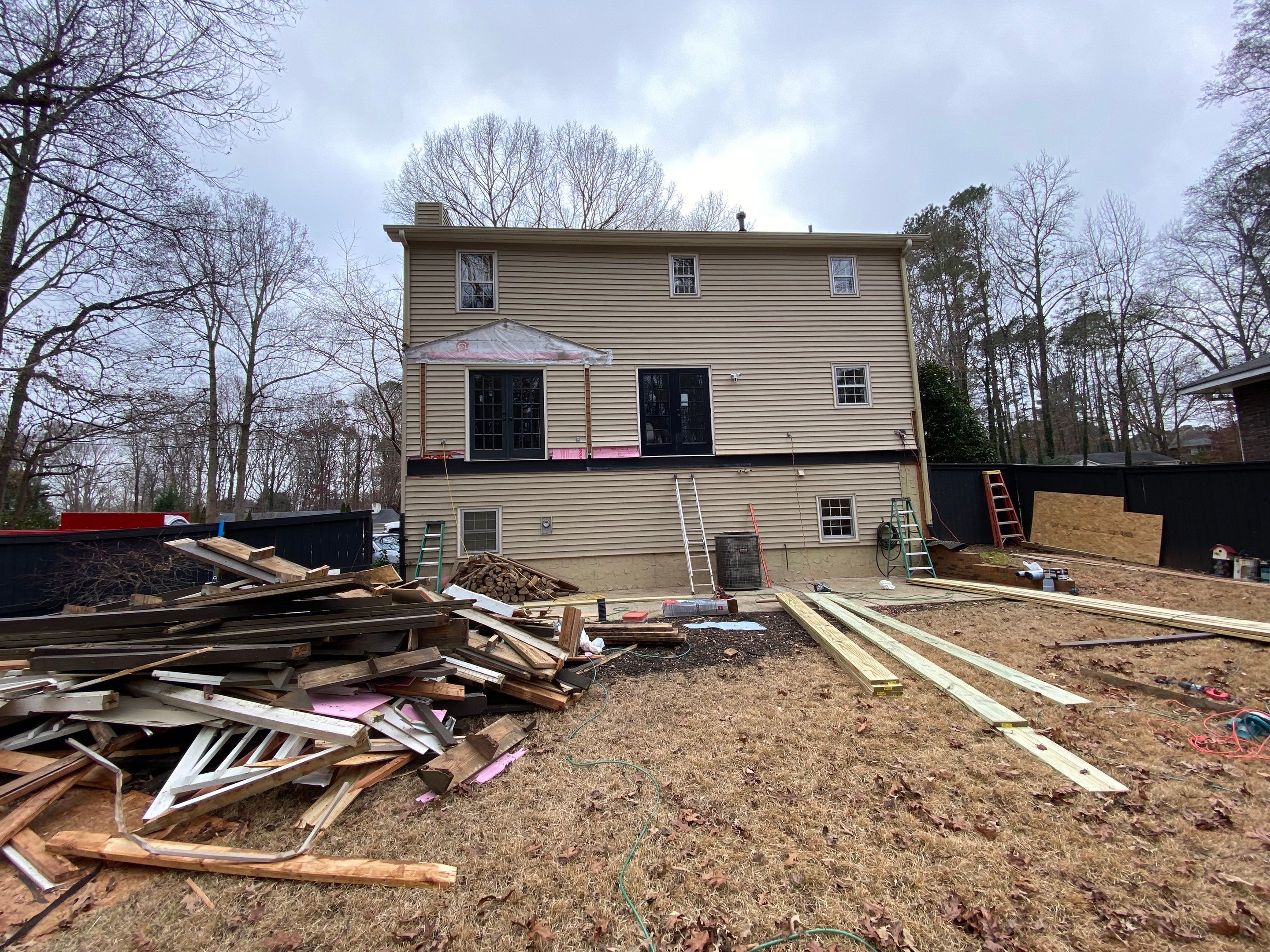Custom Screened-In Porch and Elevated Deck Construction in Smyrna by Swift Home Renovations