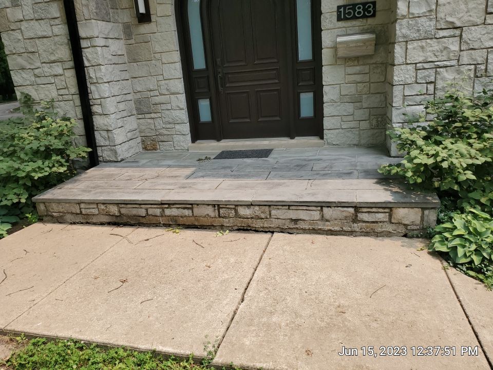 Highland Park, IL Bluestone, concrete,  Trex deck cleaning by Northern Power Washing LLC.