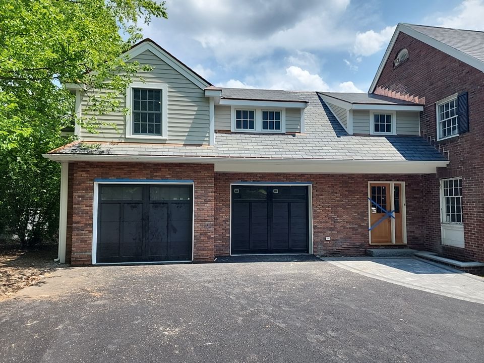 Siding on new construction in Brookline, MA by UBrothers Construction