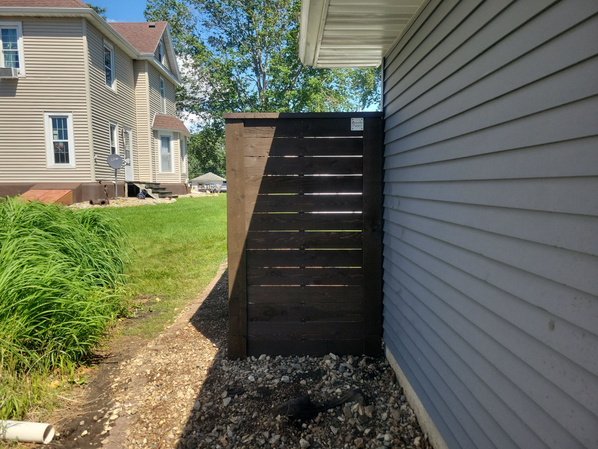 Custom Horizontal Slat Privacy Cedar Chocolate Screen Installation in Hudson by Perfect Picket Fence and Stain