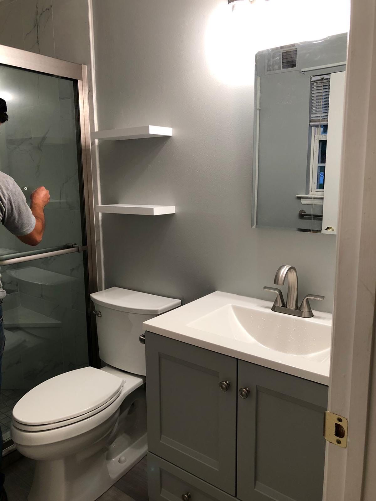 Bathroom Remodel using Tile by Home Concepts Construction