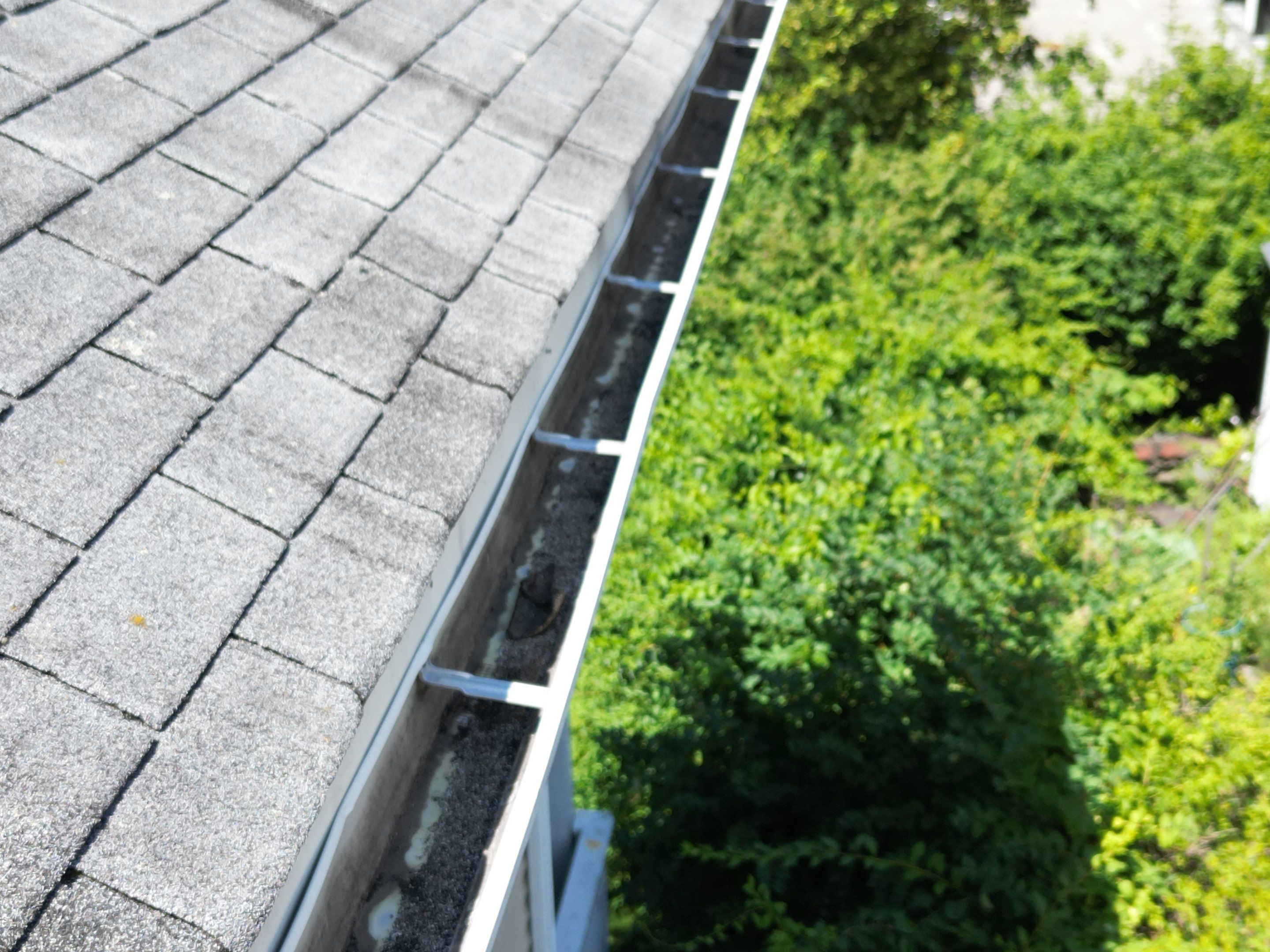 Roof Replacement with Skylight Flashing in Waltham, MA by Mighty Dog Roofing of Greater Middlesex County