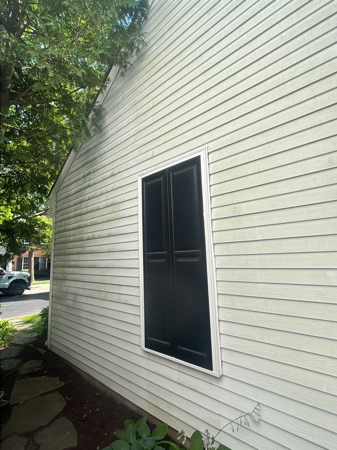 Housewashing  using Algaecide, soft wash soap by Northern Power Washing LLC.