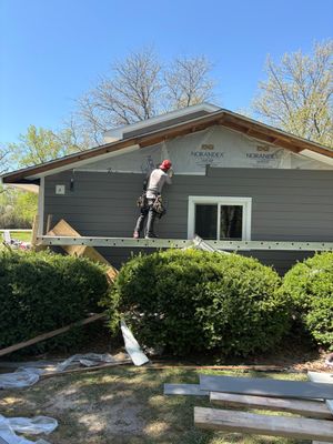 James Hardie siding install in Richmond, IL — Before