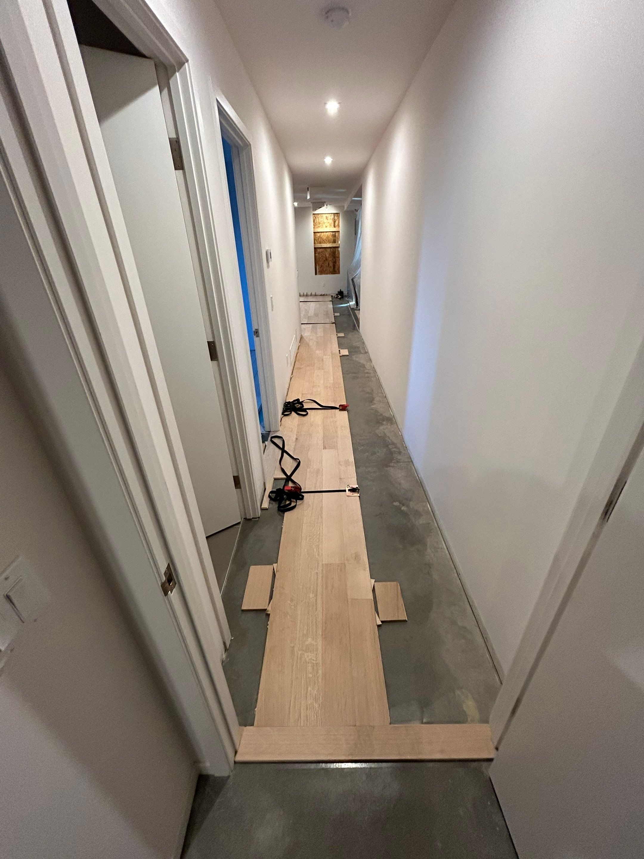 Basement Remodel using Engineered White Oak by RTBaldwin Hardwood Floors